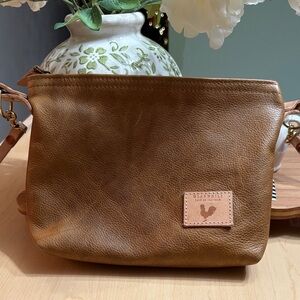 Meanwhile, Back On The Farm camel leather sling bag